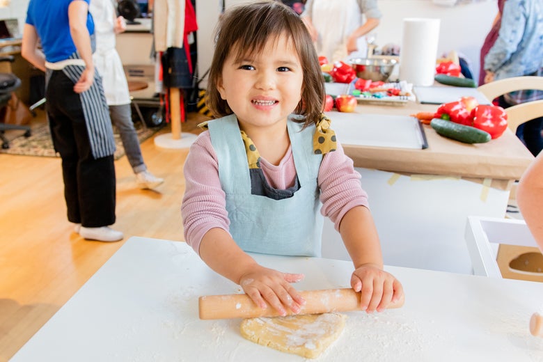 girl with rolling pin
